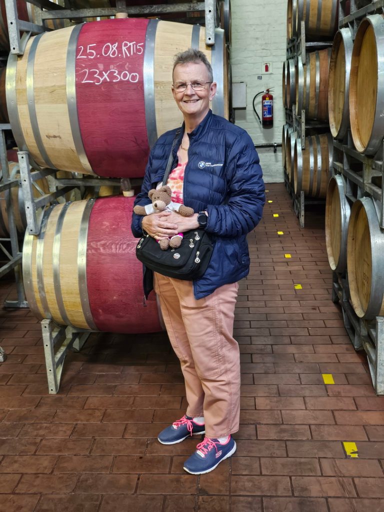 Mum taking care of Tedwina, to ensure she cannot get into a barrel