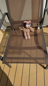 Tedwina is nude sunbathing on the balcony