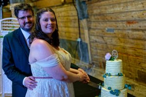 Matthew and Hannah cutting the cake
