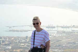 Mum and Tedwina in front of the view of the city